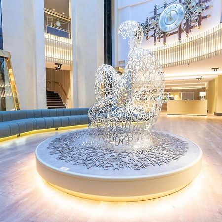 Grand Plaza Hotel & Wellness Andorra la Vella Exteriör bild Fountain in the lobby of the hotel