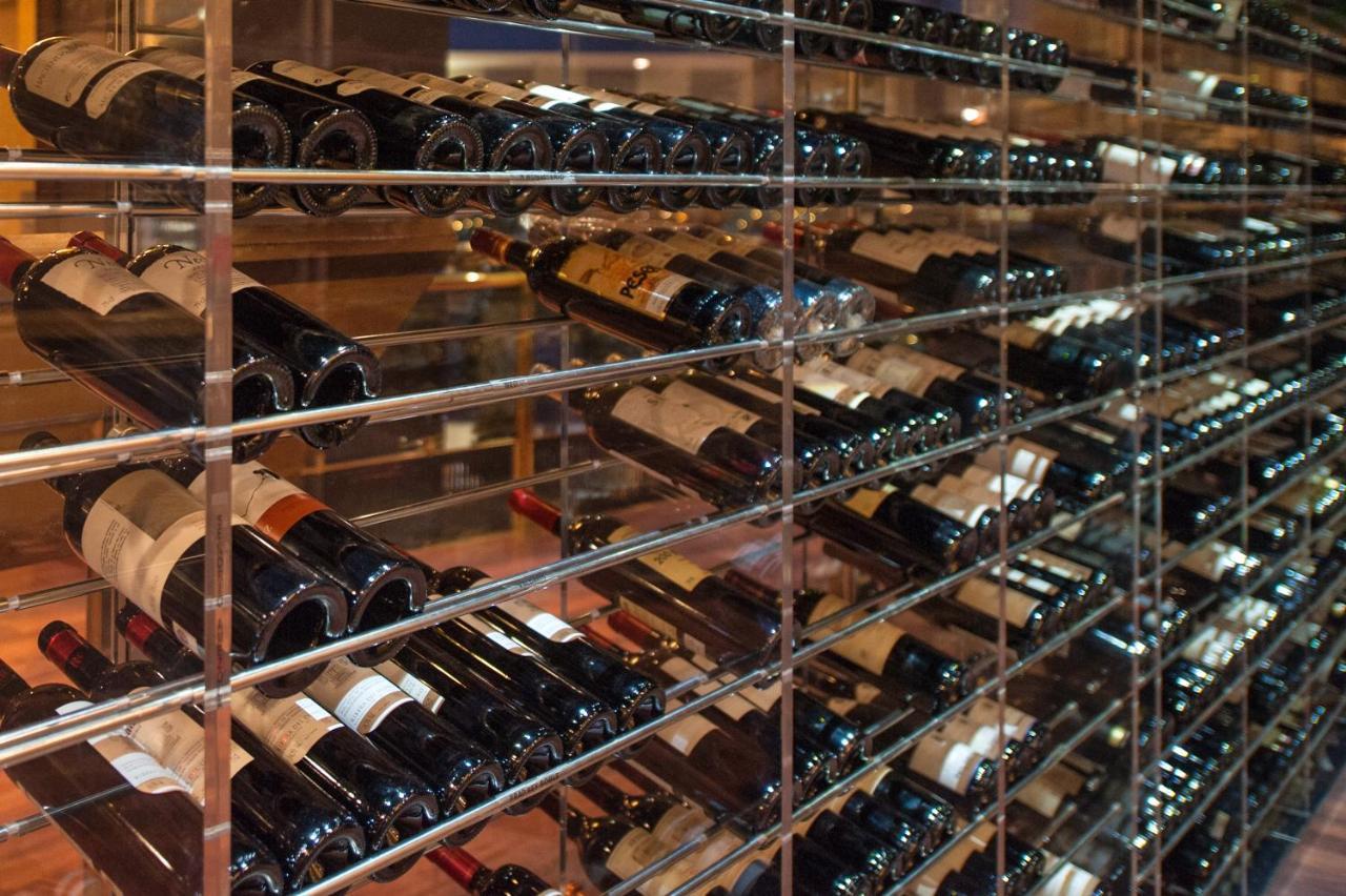 Grand Plaza Hotel & Wellness Andorra la Vella Exteriör bild Wine bottles in a wine rack